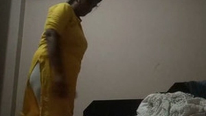 A mature MILF gets discovered while secretly observing her young stepson