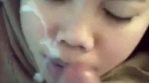 Malaysian Muslim women performing oral sex on uncut penises