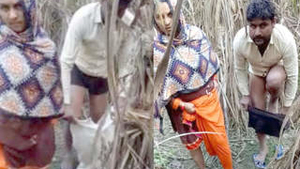 A woman and man get caught having outdoor sex during the day