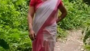 Sensual Assamese woman pleases her partner with oral skills in the jungle