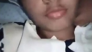 A young Indian woman indulges in self-pleasure and displays her allure