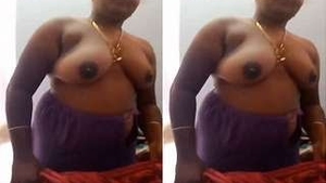 Tamil wife presses on husband's chest in hot video
