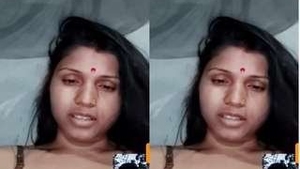 Horny woman teases her boyfriend with her big tits in a video call