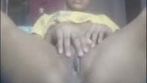 Indian girl exposes her intimate parts by opening her legs