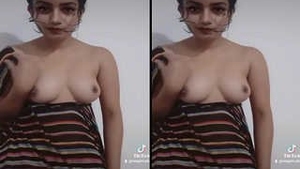 Beautiful Indian woman reveals her breasts