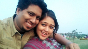 Kiran, a sultry Indian wife, engages in intimate activities with her husband's friend in a video