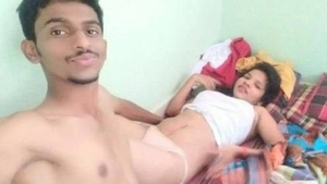 A passionate couple engages in sexual intercourse in a private setting.