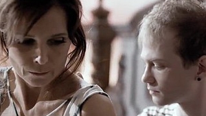 A son and his partner's mother engage in steamy action