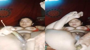 Bangladeshi girl pleasures herself with brinjals in both her holes