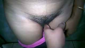 Dia flaunts her large breasts and curvy body