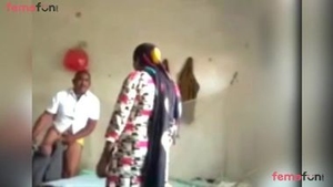 Desi man has sex with a woman in the missionary position on the bed