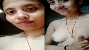 Rural girl flaunts her breasts in front of camera for partner