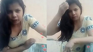 Indian bhabhi flaunts her cleavage in live video, bends over seductively