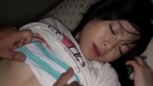 A petite Japanese teen named Tsukino Uta gives a unique oral pleasure by sucking toes and performing unconventional acts