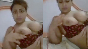 Arab housewife flaunts her big boobs in steamy video