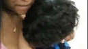 Lover's tits get a sensual oral treatment from a cute desi girl