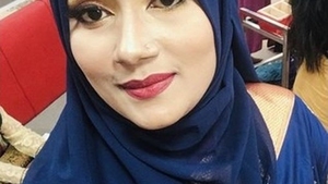 A sultry Indian wife with large breasts engages in passionate oral and vaginal sex in a highly erotic video