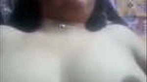 Sensual Indian middle-aged woman engages in sexual activity