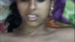 A South Asian woman experiences intense anal penetration in a passionate video