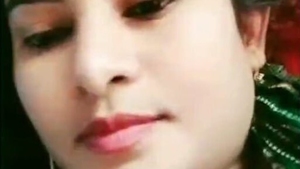 A stunning young woman entices and tempts