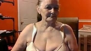 Elderly woman with large breasts in Canadian adult video