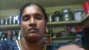 Telugu bhabhi flaunts her big boobs in a village setting