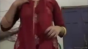 A young Bengali woman displays and stimulates her genitalia