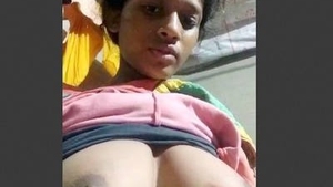 Indian wife exposes her natural tits in a village setting