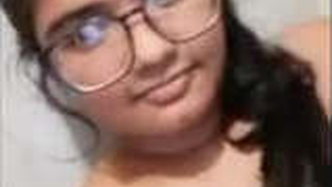 Desi babe with big tits flaunts her curves in the office