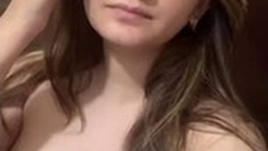 A stunning Pakistani woman proudly displays her body shape