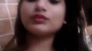 Busty babes show off their assets in the bathroom