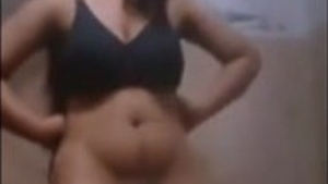 Cute amateur girl flaunts her big boobs in bathroom