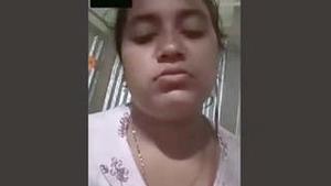 Busty girl flaunts her boobs and pussy in a steamy video