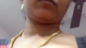 Mature Indian aunty flaunts her big boobs for her lover