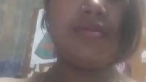 Assamese bhabi flaunts and stimulates her moist pussy