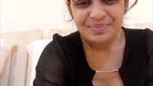 Beautiful girl with a cute face and perky boobs gets naked