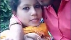 Cute Indian college girl enjoys boob sucking in the park