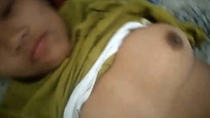 Assamese woman fondles her breasts before engaging in sexual activity