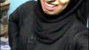 Muslim girl in hijab fingering herself in front of the camera