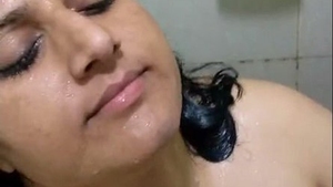 Desi Bhabi's seductive face and body in the bathroom