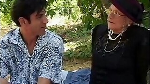 Granny Kathy gets throat fucked in the woods like a whore