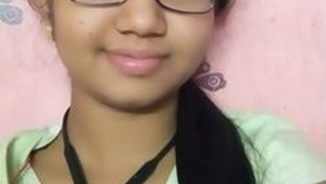 A young Indian woman displays her physique in a sensual recording