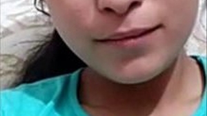 Cute desi girl from a village shows off her assets in a steamy video