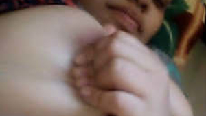 Hot Indian bhabhi flaunts her curves in a steamy video