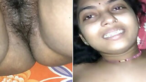 Desi lies on her back but sex partner touches her XXX breasts on camera