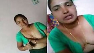 Boy is lying in bed filming Desi slut who bares her XXX tits for him