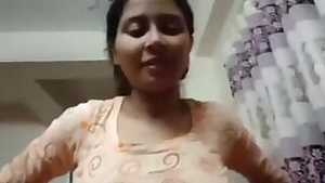 Attractive Indian takes off dress even though the boyfriend films her