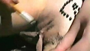 Tied up slave girl punished with a burning cigarette