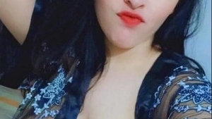 A voluptuous bhabi's intimate area is displayed in an arousing video