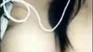 Seductive Assamese woman reveals her breasts and intimate area in a titillating video